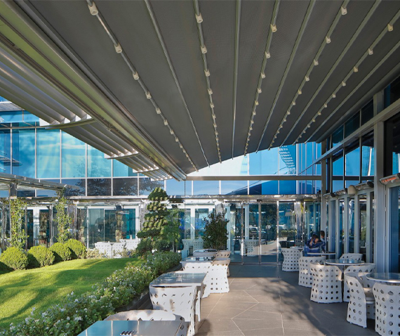 curved roof pergola in a garden side restaurant